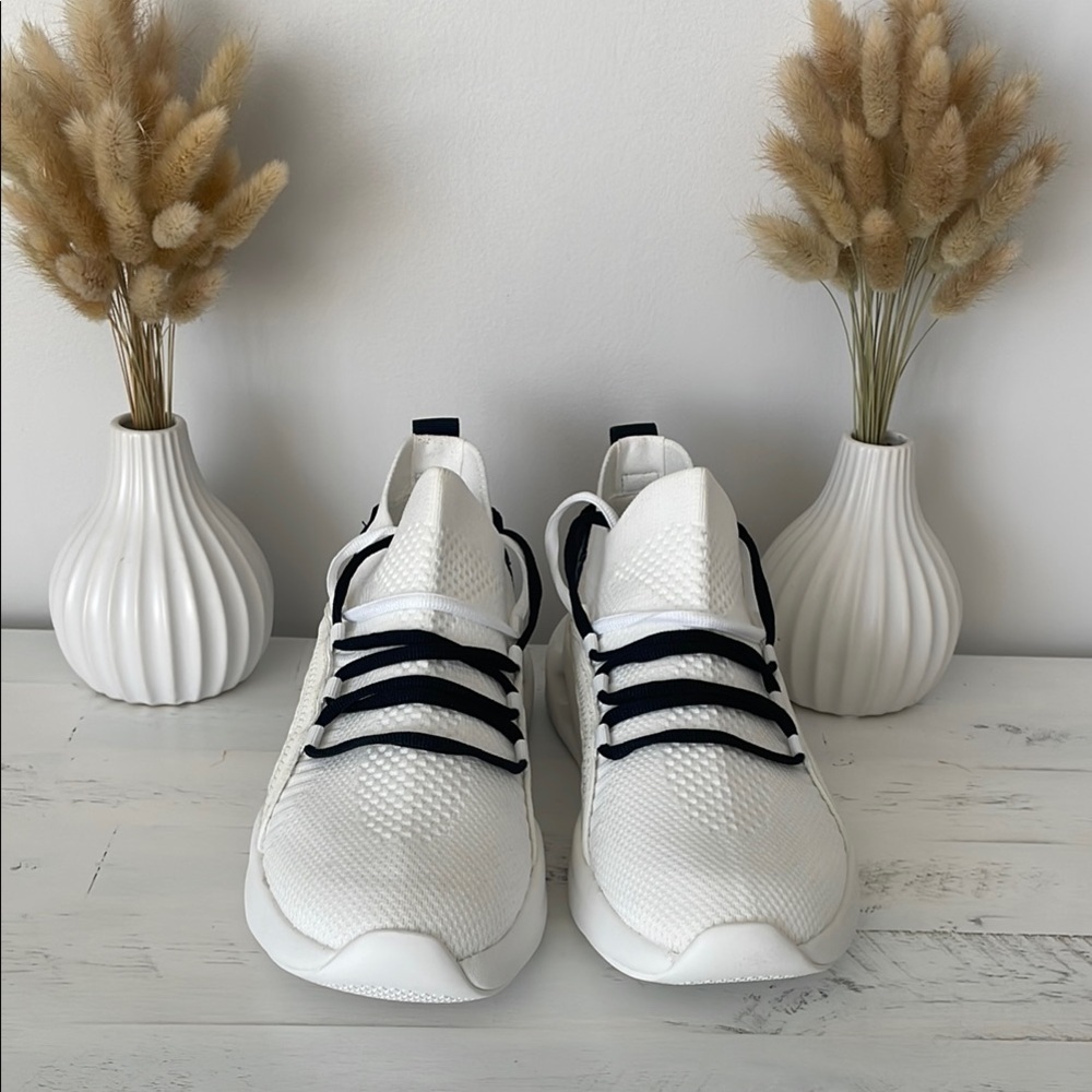 Aldo Stylish White Sneakers with Black Accents - Picture 2 of 6